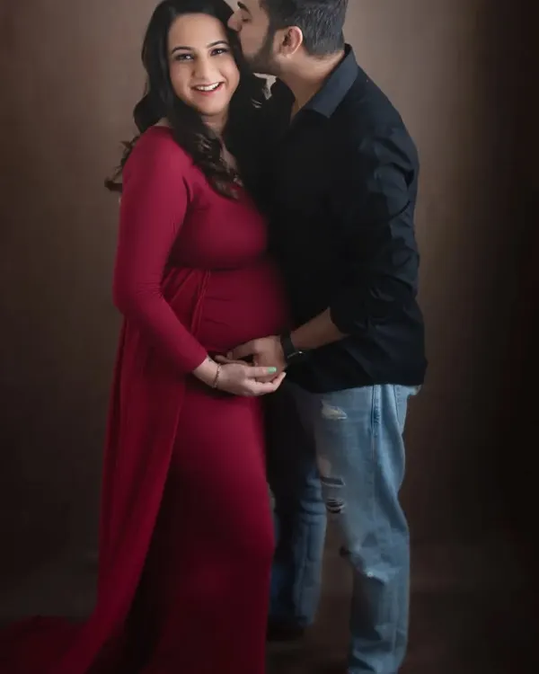 The anticipation and love between a couple expecting their first child is so beautiful. I love the simplicity of this portrait, focusing on their connection and the beautiful baby bump.