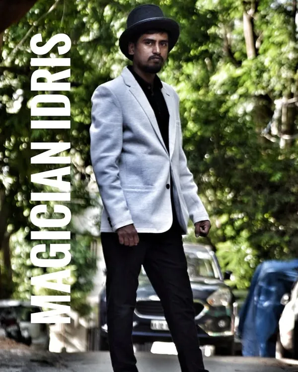 This is me, Magician Idris. I'm not just a performer, I'm a teacher dedicated to sharing the joy of sakhath comedy aada jaadu (super fun magic tricks) with you.