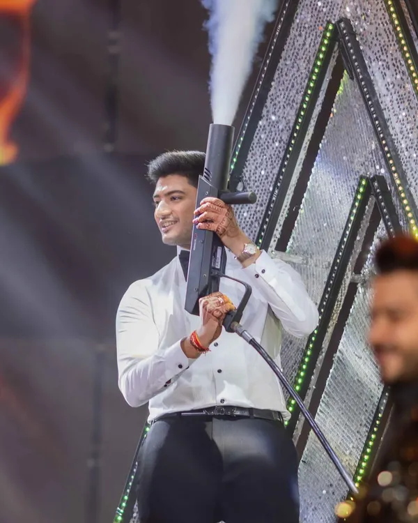 This groom brought the energy of a Bollywood hero to the stage. We amped up his performance with a CO2 gun prop, giving his act an extra blast of fun and making it a total crowd-pleaser.