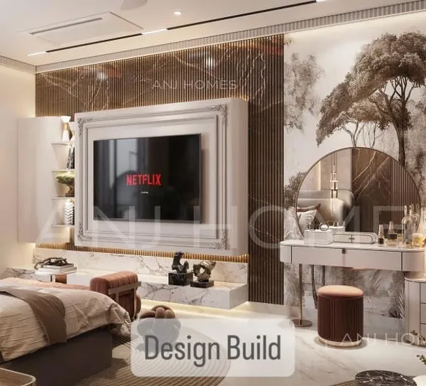 This master bedroom in a Gurgaon villa is a perfect example of modern luxury. I combined fluted marble walls, custom-designed millwork, and layered lighting to create a space that feels both grand and intimate. The bespoke vanity and integrated TV unit show how function and high-end design can work together seamlessly.