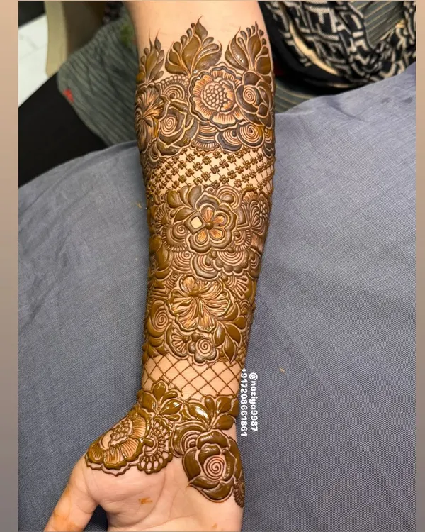 The fresh paste of a full arm design. You can see the different textures created by using fine lines, dots, and bold filled areas.