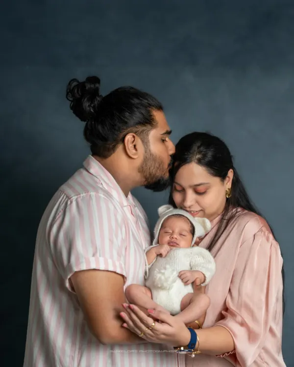 This is what a dream looks like. I love capturing the moment a family is complete, with both parents holding their tiny new world in their hands.