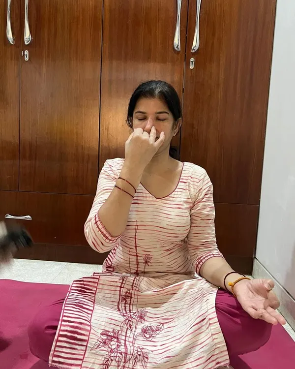 Guiding a private client through Anulom Vilom pranayama. One-on-one sessions allow me to focus entirely on your needs, whether it's for stress reduction or pain relief.