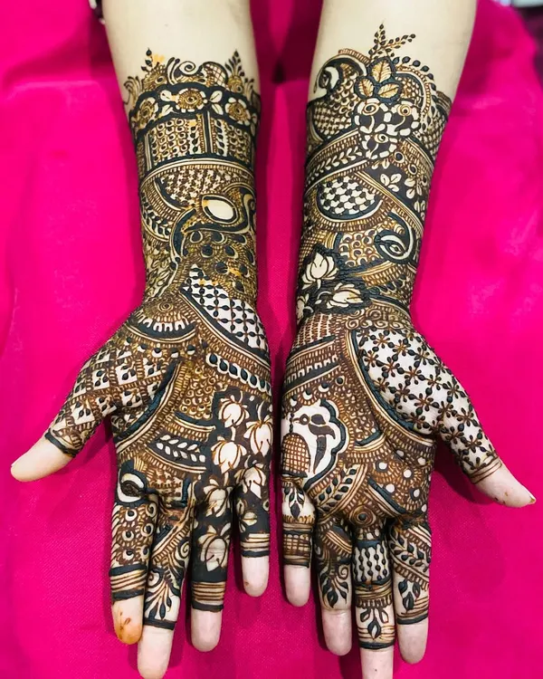 This is a classic, full-coverage traditional design. It is rich with details, including peacock and floral elements, checkerboard patterns, and fine lines, creating a stunning and elaborate look.