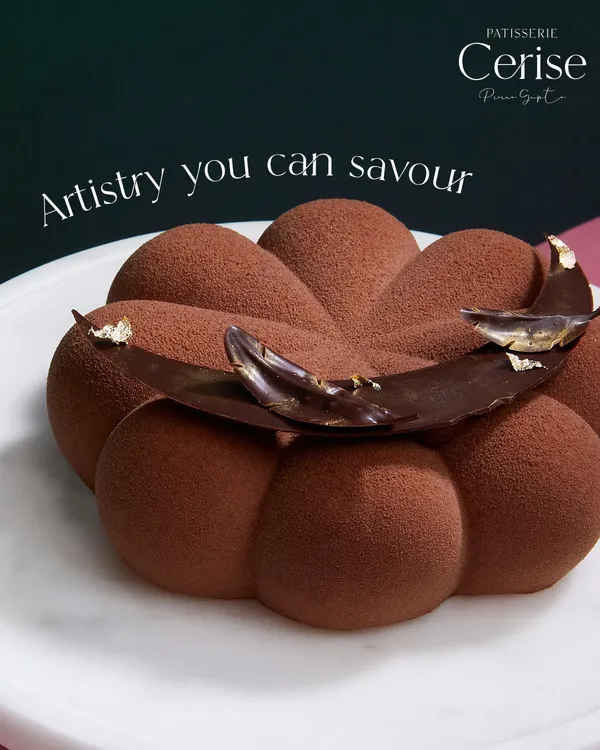 This is artistry you can savour. My Chocolate Dreams entremet, with its velvety texture and intricate chocolate garnish, is a masterpiece in every bite.