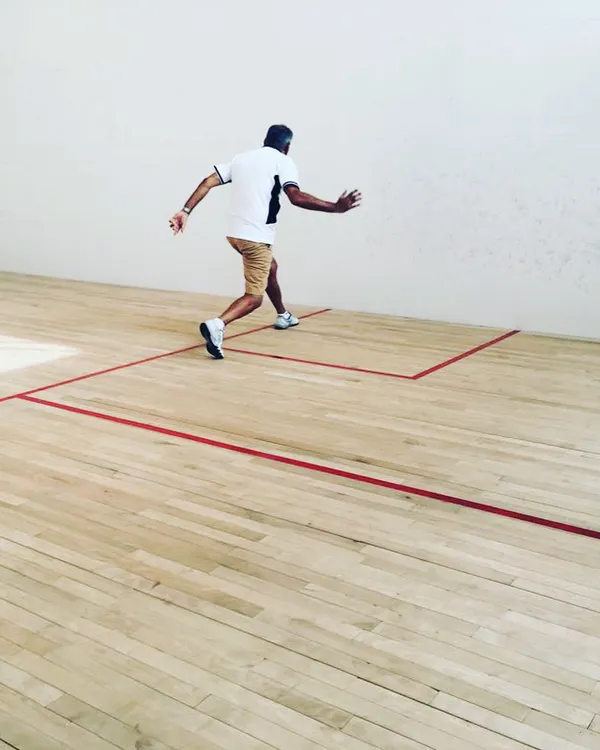 Coach Ray Malik demonstrates how to cover the court efficiently. Learning from an experienced professional helps our players understand positioning and anticipation.