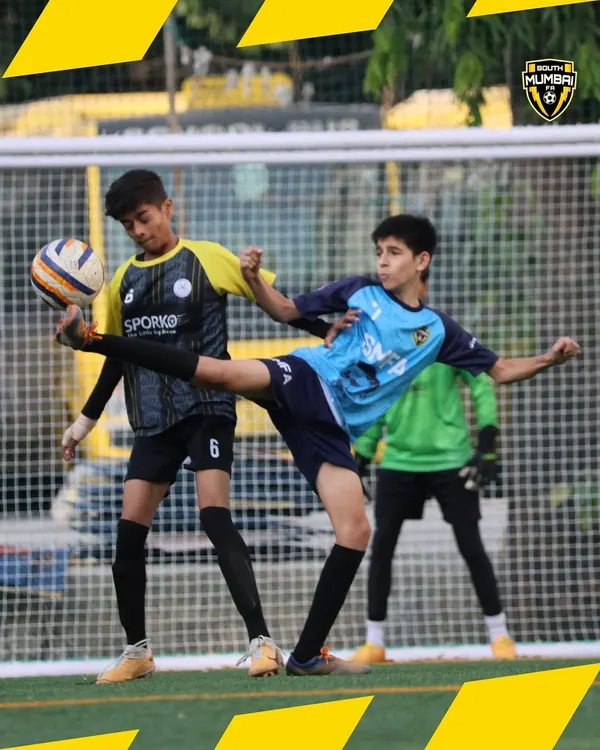 Real players rise under pressure. This action shot from a youth match shows the intensity and tactical awareness we instill in our players.