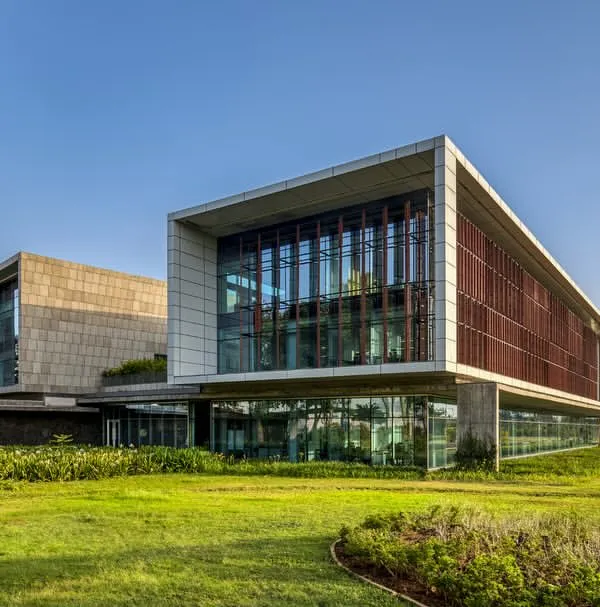 Our award-winning administrative office for JSW at Vasind, a design that consolidates functions into a campus that is responsive to climate and integrated with the landscape. The architecture is conceived as a series of robust experiences engaging with nature, fostering collaboration and well-being.