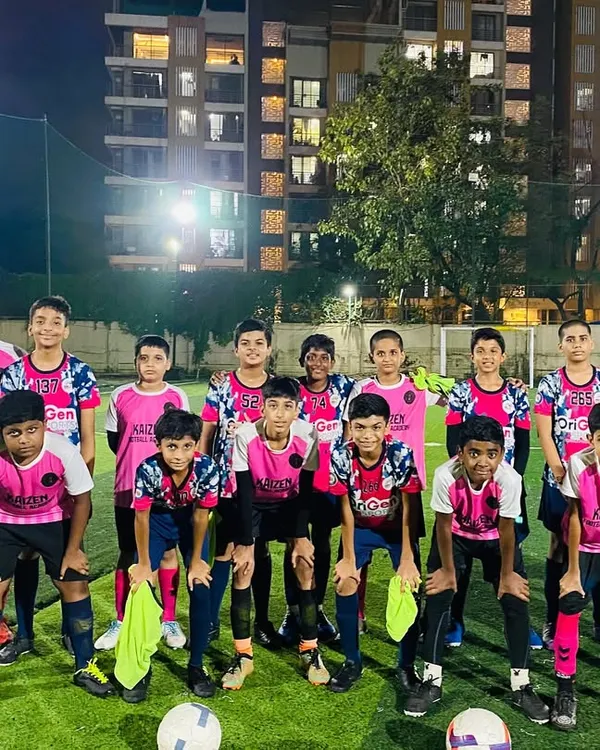 Our U15 and U17 boys teams after a competitive practice match against Kaizen FC. These matches against other skilled teams are essential for their development.