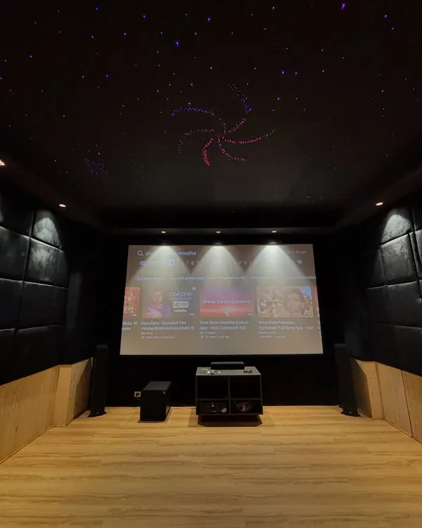 This is what a dedicated home cinema is all about. For this project, I installed a complete 7.1.2 Dolby Atmos system with an Optoma laser projector and a massive 180 inch fixed frame screen. The custom starlight ceiling and acoustic wall panels create a truly immersive experience, making you feel like you're in a real movie theater.