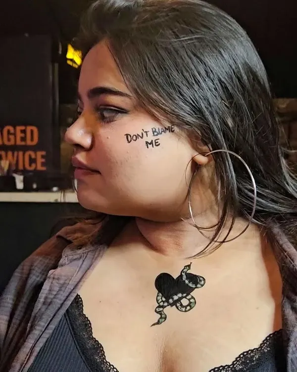 "Don't Blame Me." A fun, Reputation-era inspired look with a temporary snake and heart tattoo for a Taylor Swift themed party. I love creating these custom pieces for events.