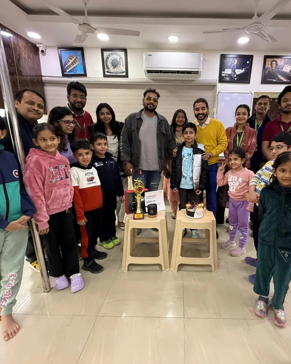 The whole Dhwani family celebrating our student Abhinav Roy's victory. He won 1st prize in the Radio Mirchi Spardha Idol 2024, a national competition with over 2000 participants.