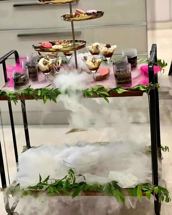 Make your dessert course a showstopper. This dramatic dessert cart, complete with dry ice for a magical effect, is perfect for adding a 'wow' element to any house party.