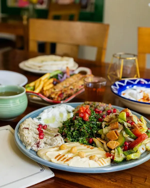 Experiencing the calm at Cafe Zubaan. This shot captures the ambiance of the cafe along with their beautiful food, telling a story of a relaxing dining experience. This is the kind of content we create for cafe promotions.