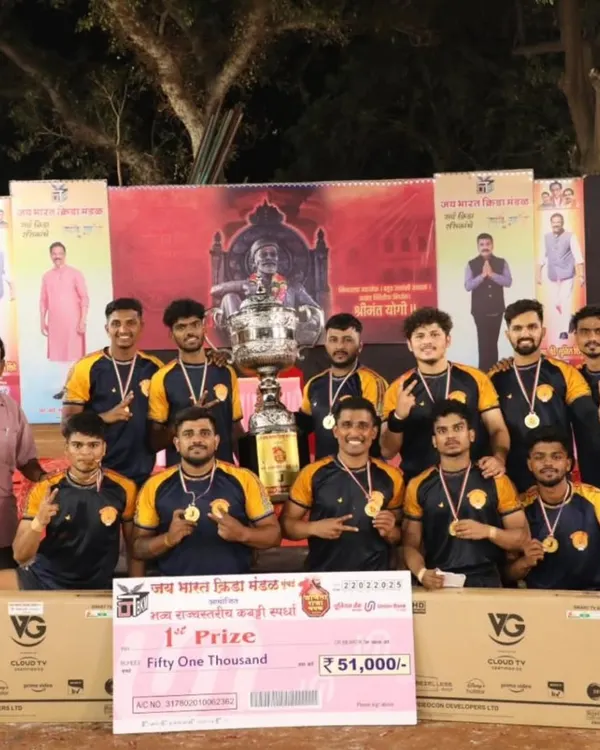 Our senior team celebrating as state champions, holding the first prize check of ₹51,000 and the winner's trophy.