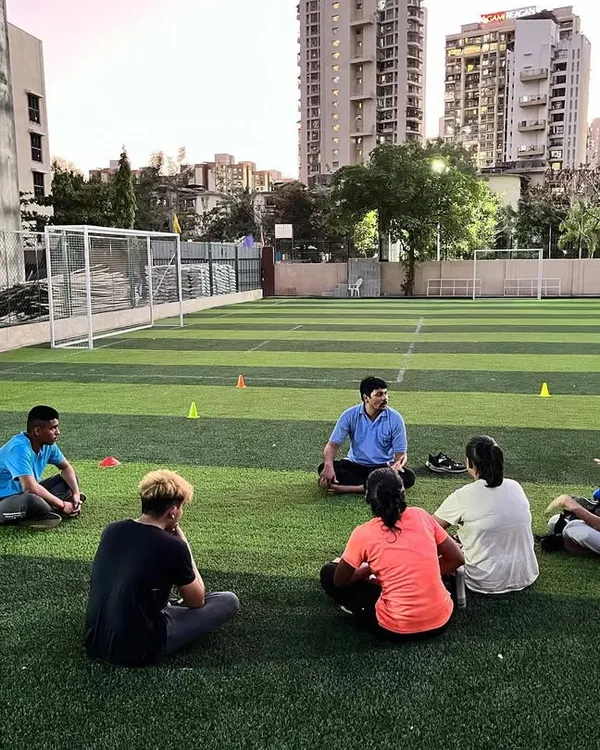 The work isn't over when the gloves come off. A post-training talk session on the field, where we discuss what we learned and how to improve mentally and physically.