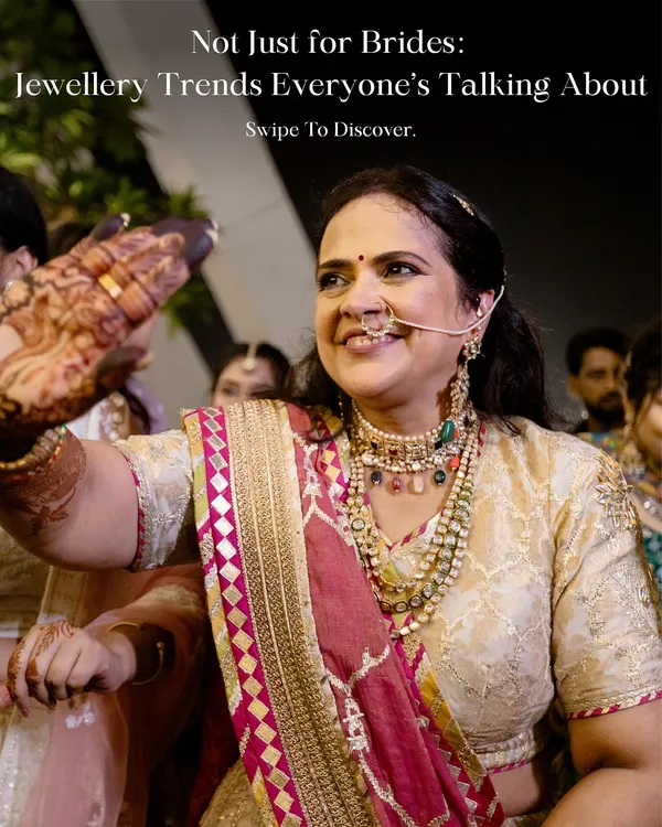 Jewelry trends aren't just for brides. Here, the mother of the groom looks absolutely radiant, embracing statement jewelry with layered necklaces and a beautiful nose ring that enhances her Simar Dugal outfit.