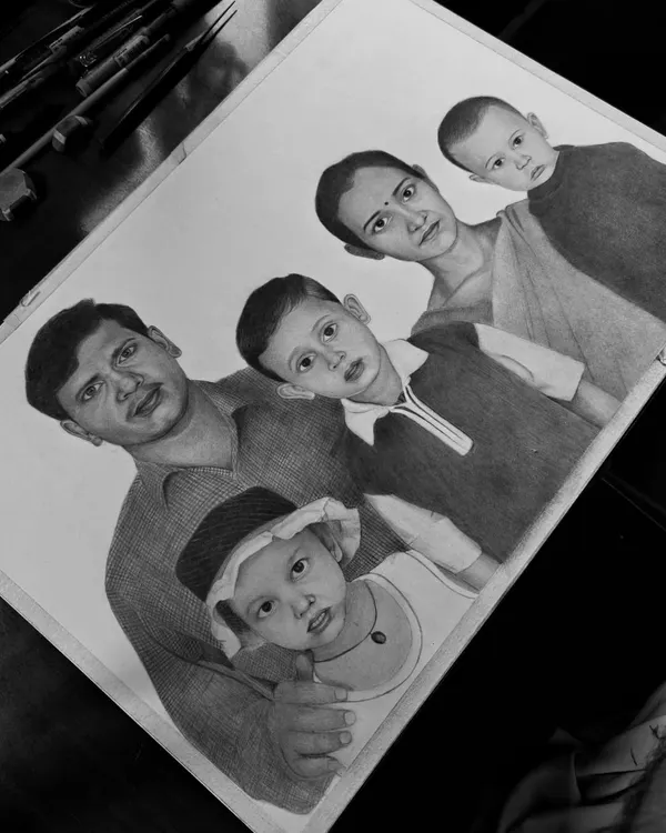 The final result of a commissioned A3 family portrait. It’s a beautiful way to have everyone in one frame, creating a memory that lasts longer than a photograph.