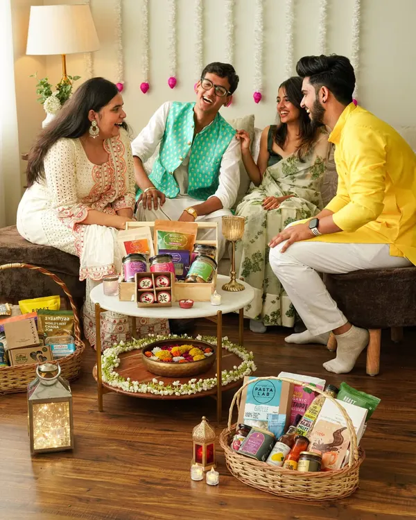 Capturing the joy of Diwali with a group of friends laughing and sharing festive treats. This lifestyle shot is all about the feeling of togetherness and celebration.