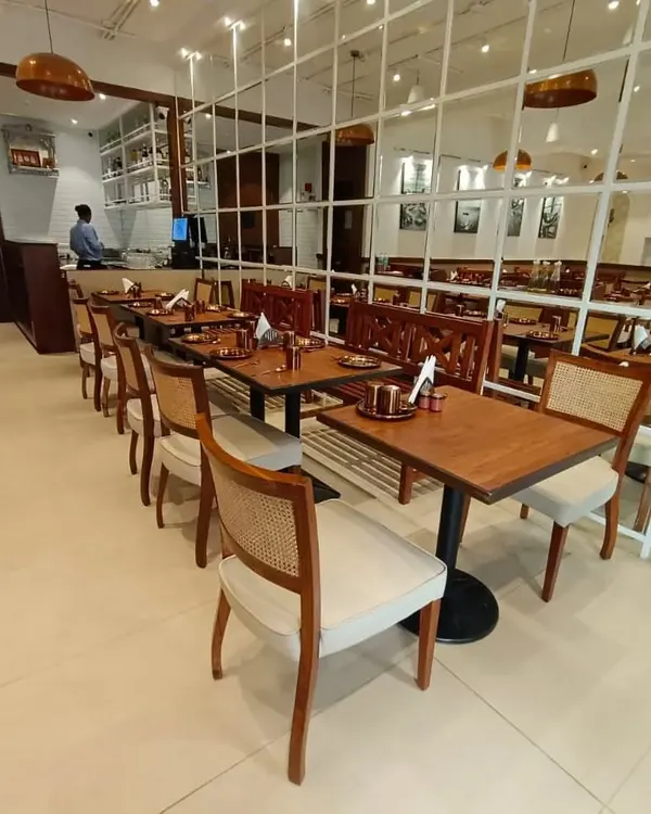 I had the opportunity to build all the furniture for The Big Fish & Co. restaurant in Dadar, Mumbai. This includes the custom dining chairs with cane backs, solid wood tables, and benches.
