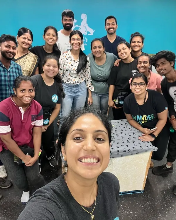 A selfie with my amazing team of 15! These are the hardworking people who help me run the facility and provide the best care for every dog that comes through our doors.