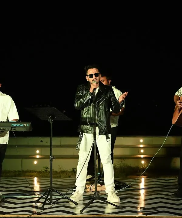 Performing with my full band allows us to create a rich, powerful sound for larger events and concerts. This setup includes live keyboards, guitar, and percussion to bring a complete musical experience.