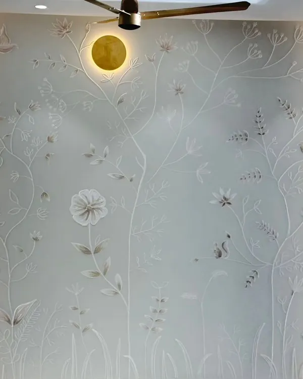 This custom 3D botanical mural, enhanced with integrated lighting, transforms a simple wall into a serene and captivating focal point. The delicate, hand-sculpted flowers and vines create an elegant play of light and shadow, bringing a sense of nature indoors.