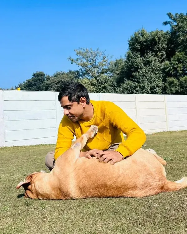That's me, Deepak, with one of our guests. My vision has always been to provide the best care for every pet, and my dedication comes from a deep love for all animals.