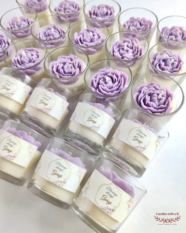 An order of 25 personalized peony votive candles in a lovely lavender color, created as return gifts for a Guruji Satsang in Delhi.