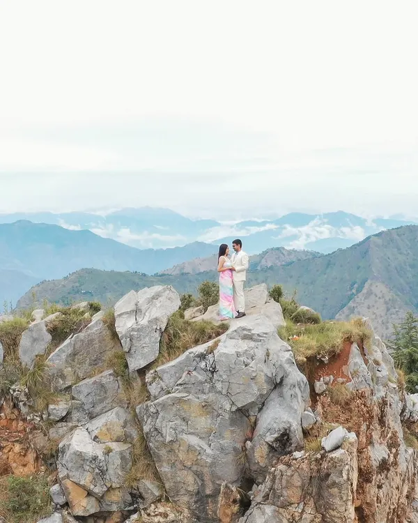 This is what a fairytale in the hills looks like. I specialize in finding these epic, breathtaking spots in Himachal for pre-wedding photoshoots, creating images that feel as grand as your love story.