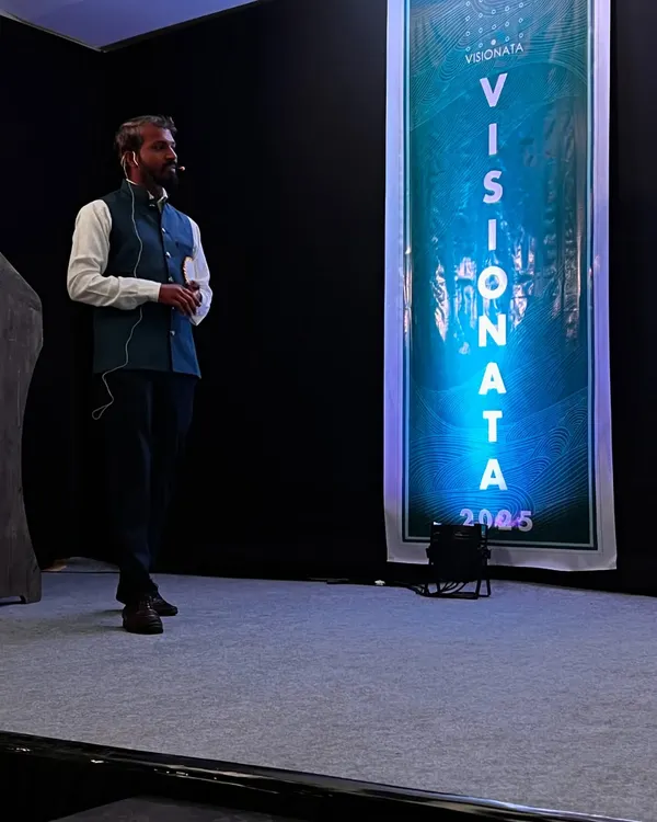 On stage at 'Visionata,' an event hosted by Dr. B Hirey College of Architecture. I feel completely in my element when I get to connect with an audience of young, creative minds and share my passion for art.
