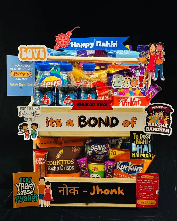 This "Bond of Nok-Jhonk" hamper is a bestseller, filled with snacks and quirky messages that celebrate the fun banter between siblings. It’s a perfect mix of treats and memories for your Raksha Bandhan celebration.