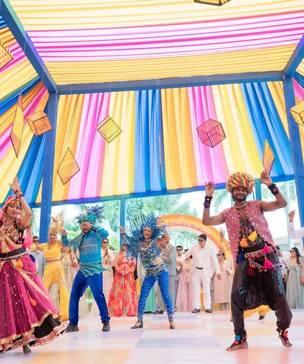 For this 'World Tour' themed carnival, we created a vibrant, high-energy dance number. The stage was a riot of color, with dancers in diverse costumes representing different cultures, making it a truly global celebration.