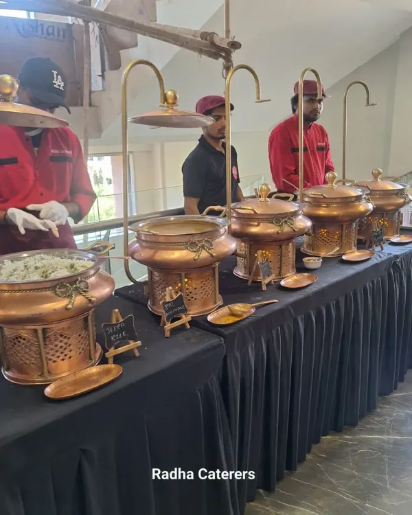 This is the standard of quality you can expect from us. I believe in making a great first impression, which is why we use this elegant brass and copper buffet setup for full-service events. It shows professionalism and care before the first guest even takes a plate.