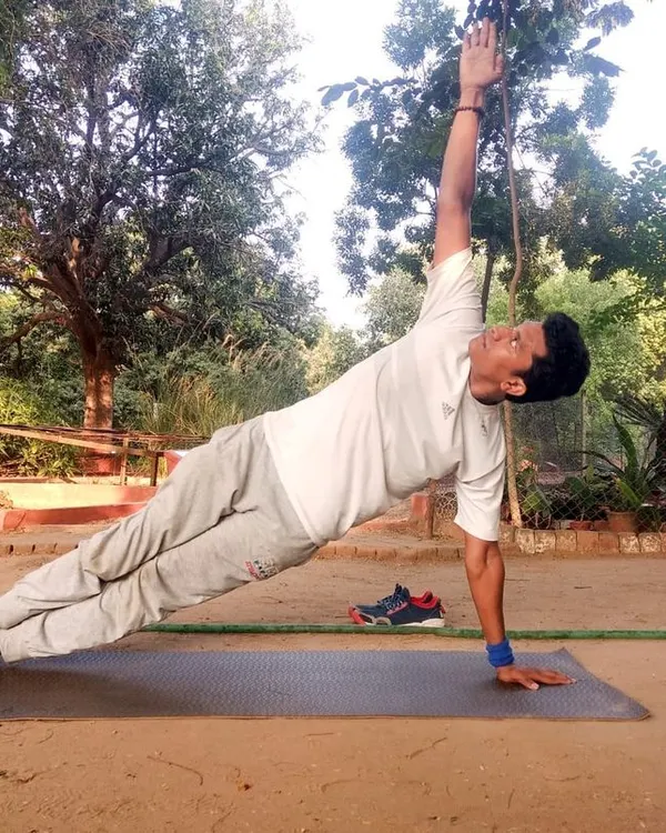 Vashishthasana, or the Side Plank Pose, is a powerful asana for building strength in the arms, wrists, and core. It teaches us that a calm mind is the source of inner strength and self-confidence, which are essential for good health.