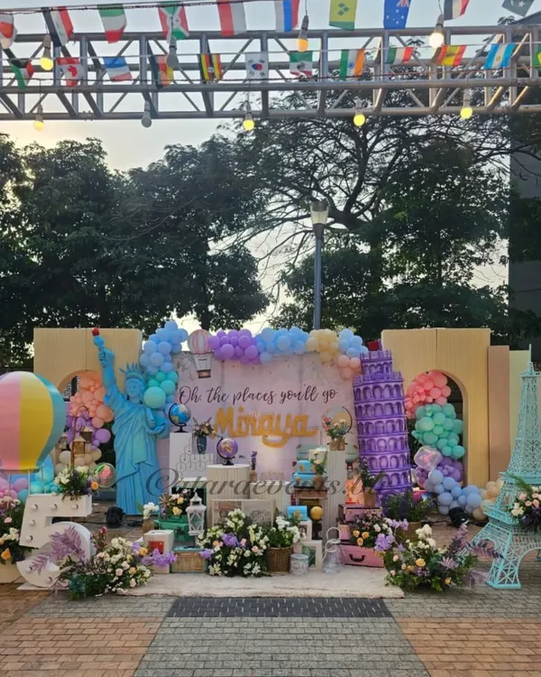 Oh, the places you’ll go! This expansive 'Around the World' themed party was a spectacular adventure, featuring global landmarks and pastel skies. It shows how I can transform a large outdoor space into a completely immersive world for your child's biggest dreams.