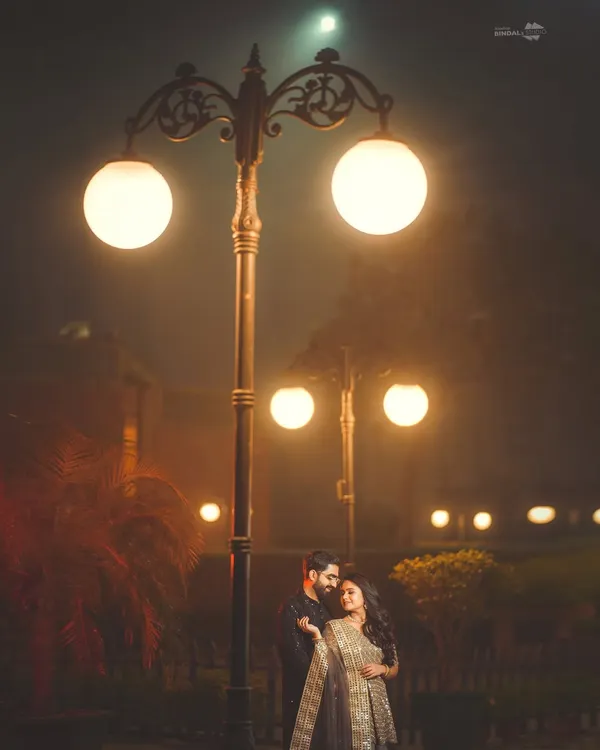 Under the soft glow of city lights, we create pure magic. This night portrait showcases my expertise in using ambient light to craft a moody, romantic, and unforgettable scene.