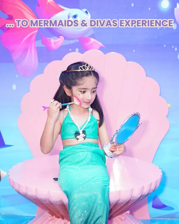 A magical transformation into a beautiful mermaid. Our unique 'Mermaids of Wooray' experience includes a complete costume and a themed backdrop, making fantasy a reality for your little one.