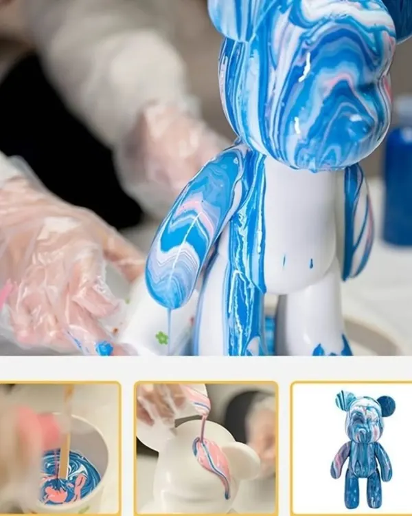 A step-by-step look at the fluid bear process, from mixing the paints to pouring them over the statue to create a marbled effect.