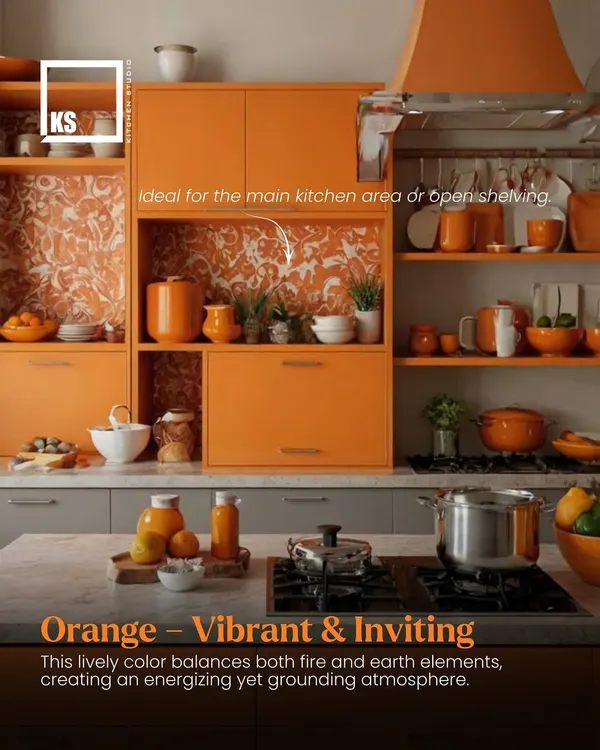 According to Vastu, orange is a vibrant and inviting color that balances fire and earth elements, creating an energizing atmosphere in the kitchen.