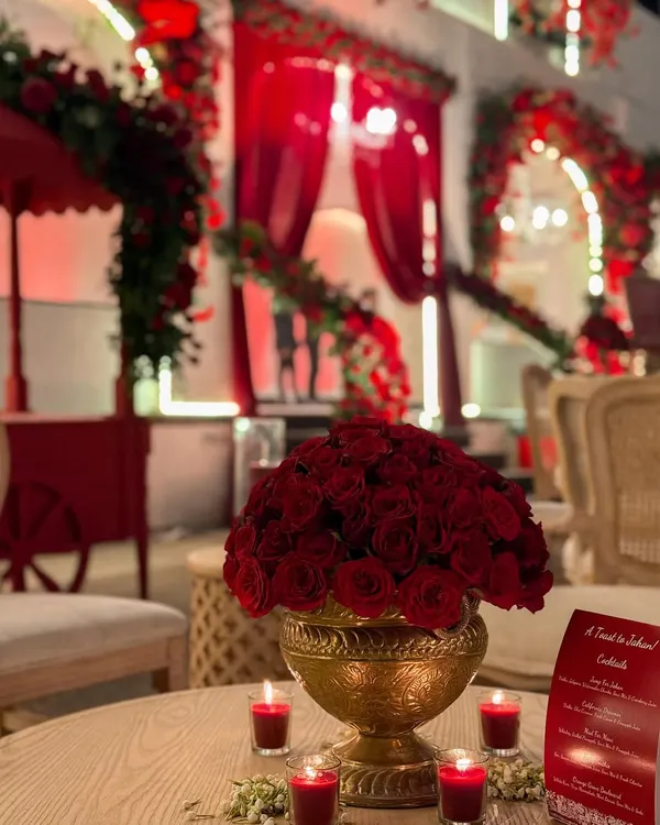 This is the kind of atmosphere we love to create. For this Navjote, we transformed the venue with a scarlet and gold theme, where our bar became a centerpiece of grandeur, surrounded by hundreds of red roses and candlelights.