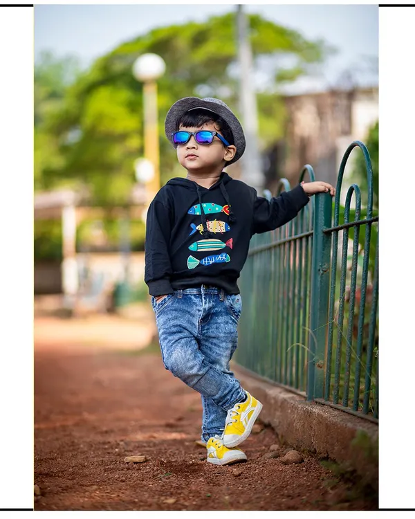 Capturing cool and confident personalities during an outdoor kids photography session in Mumbai. I let children play and be themselves, resulting in authentic and stylish portraits like this one.