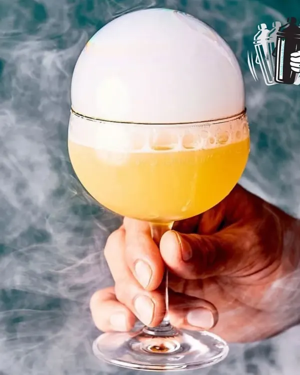 We're more than just bartenders, we're cocktail artists. Here, a Flavour Blaster is used to create an aromatic bubble, adding a touch of theatre and a burst of scent right before you take a sip.