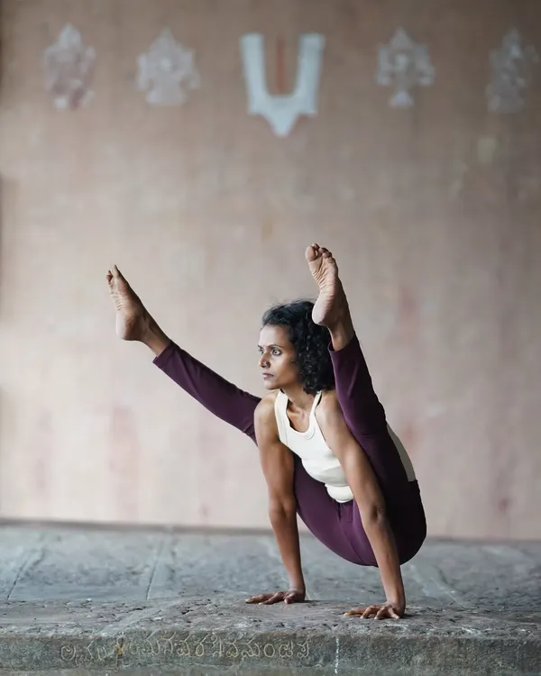This practice asks us to find balance between strength and surrender. Here, in an arm balance, I am reminded that growth is often uncomfortable, but it is in taking these small, challenging steps that we build momentum and discover our inner fire.