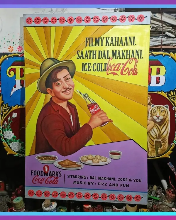 A hand-painted poster featuring the legendary actor Raj Kapoor for a Coca-Cola 'Foodmarks' event, seen here in my workshop.