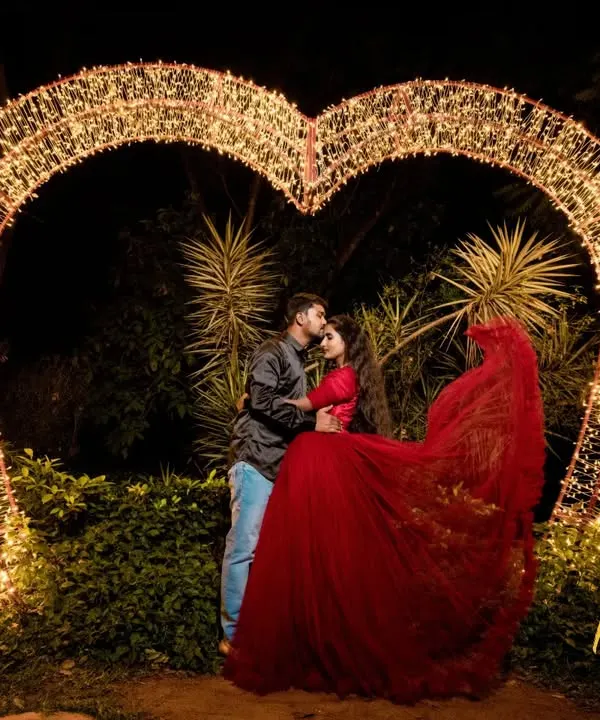 A magical pre-wedding moment captured under a heart of lights. I love creating these fairytale scenes that make your love story feel epic.