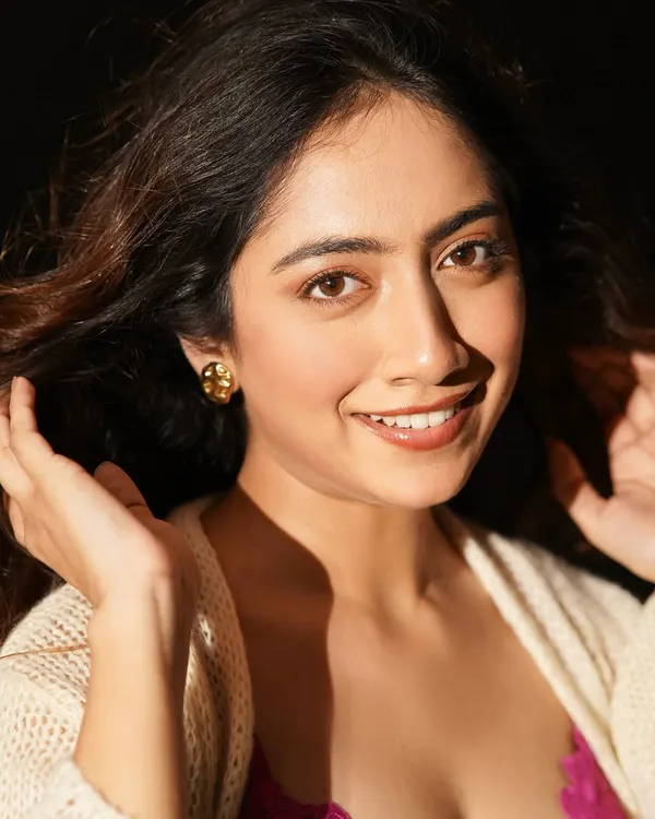 A happy and radiant portrait. I created a simple, glowing makeup look with soft, natural hair to capture a feeling of warmth and effortless beauty.