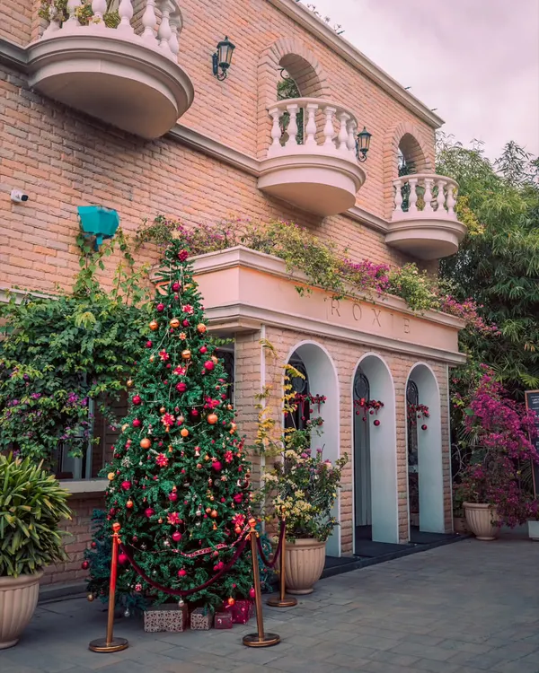 Christmas at the mansion. The entrance is adorned with a beautiful tree and festive decorations, welcoming guests into a European-inspired winter wonderland right here in Bangalore.