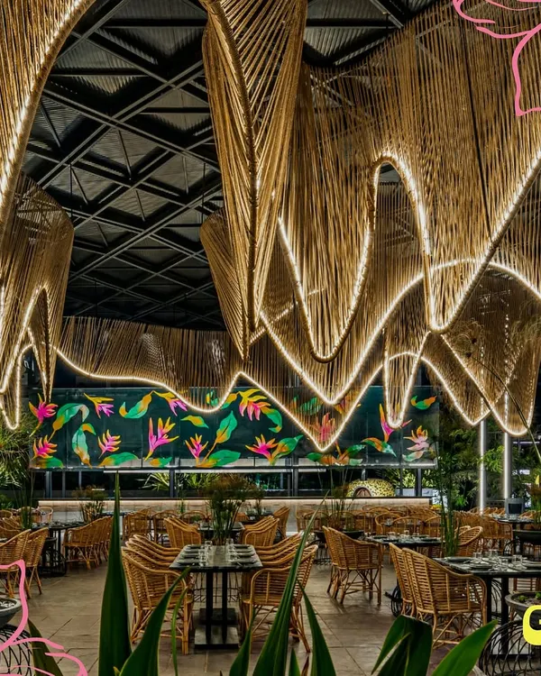 Welcome to my little corner of Bangalore. I designed this space with soaring ceilings and lush greenery to feel like a true escape, where you can host a big celebration or just find a quiet table for yourself. This is where good times and great memories are made.