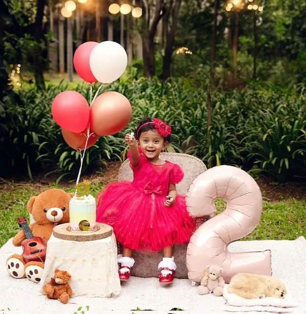 Two years of pure sweetness! Milestone birthdays are such a joy to celebrate. I create fun, themed setups like this outdoor picnic to capture the personality and excitement of your little one's special day.